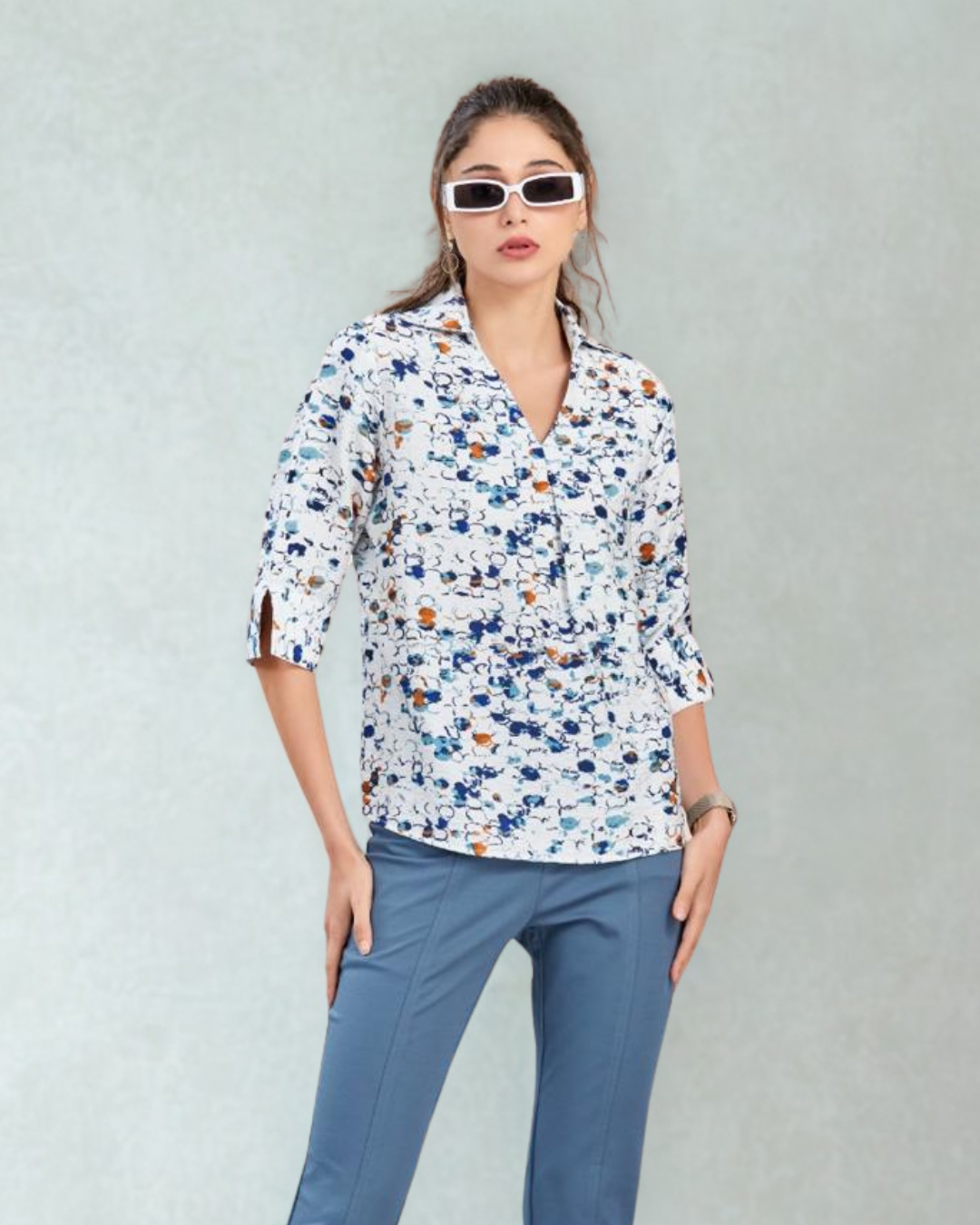 White with Orange and Blue Spoted Top